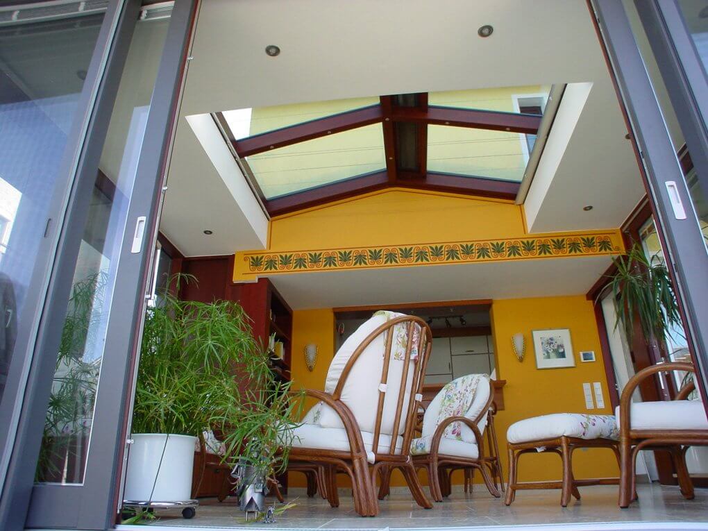 Innenansicht vom Flachdachwintergarten mit LED Beleuchtung